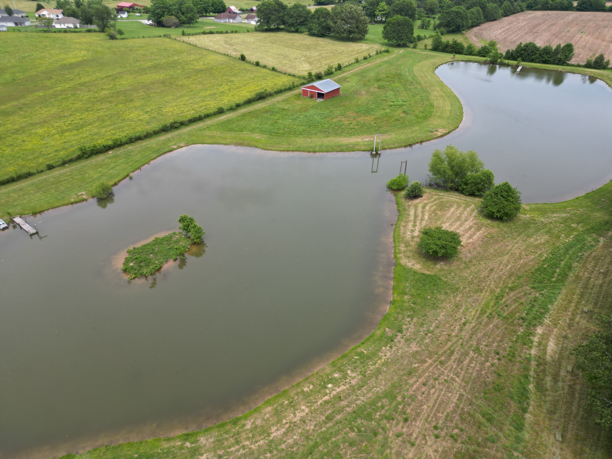 81 Slaughter Pen Road Ardmore, TN 38449 - Photo 56 of 63 a view of a lake from a yard