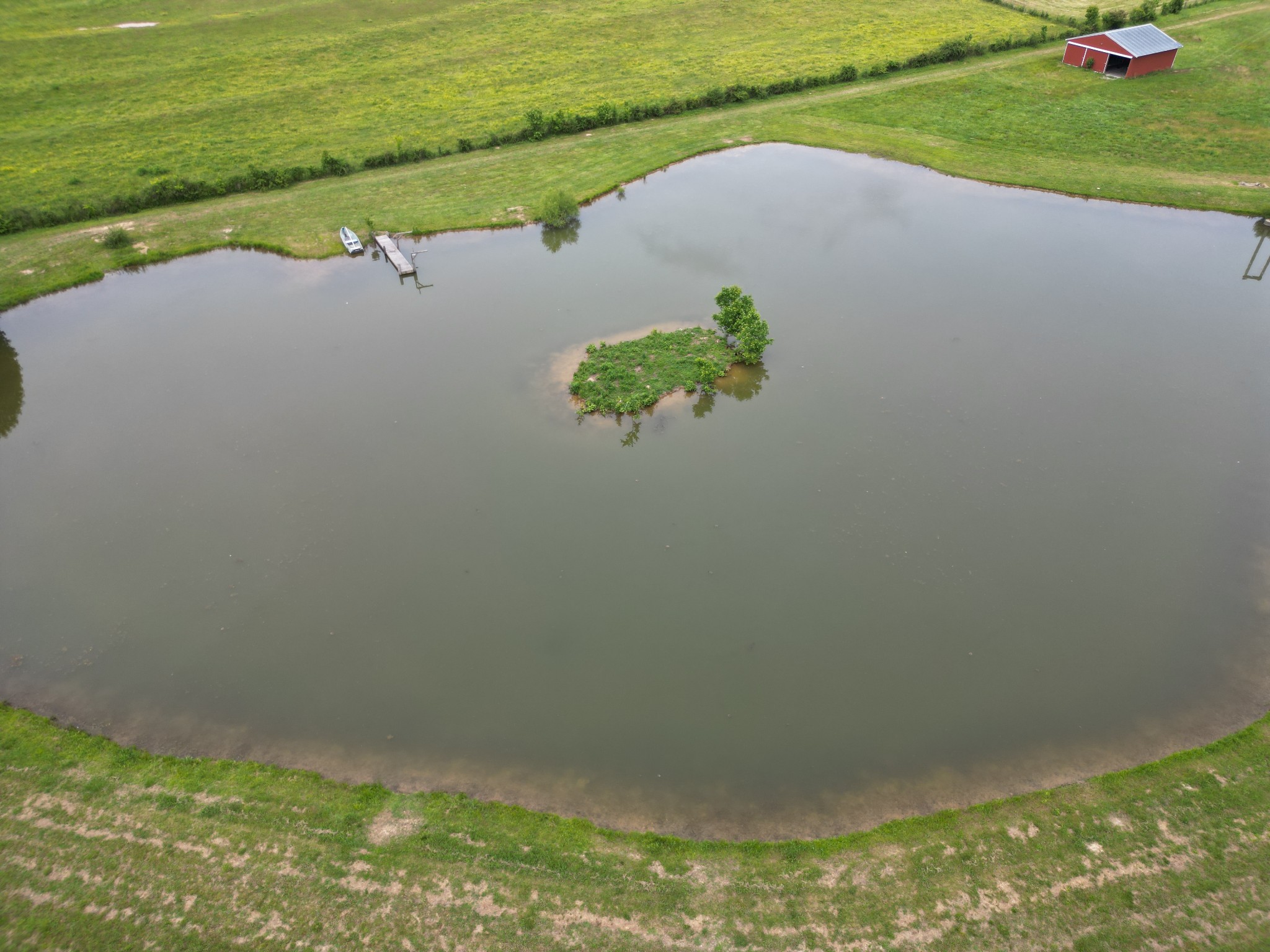 81 Slaughter Pen Road Ardmore, TN 38449 - Photo 58 of 63 a view of a lake from a yard