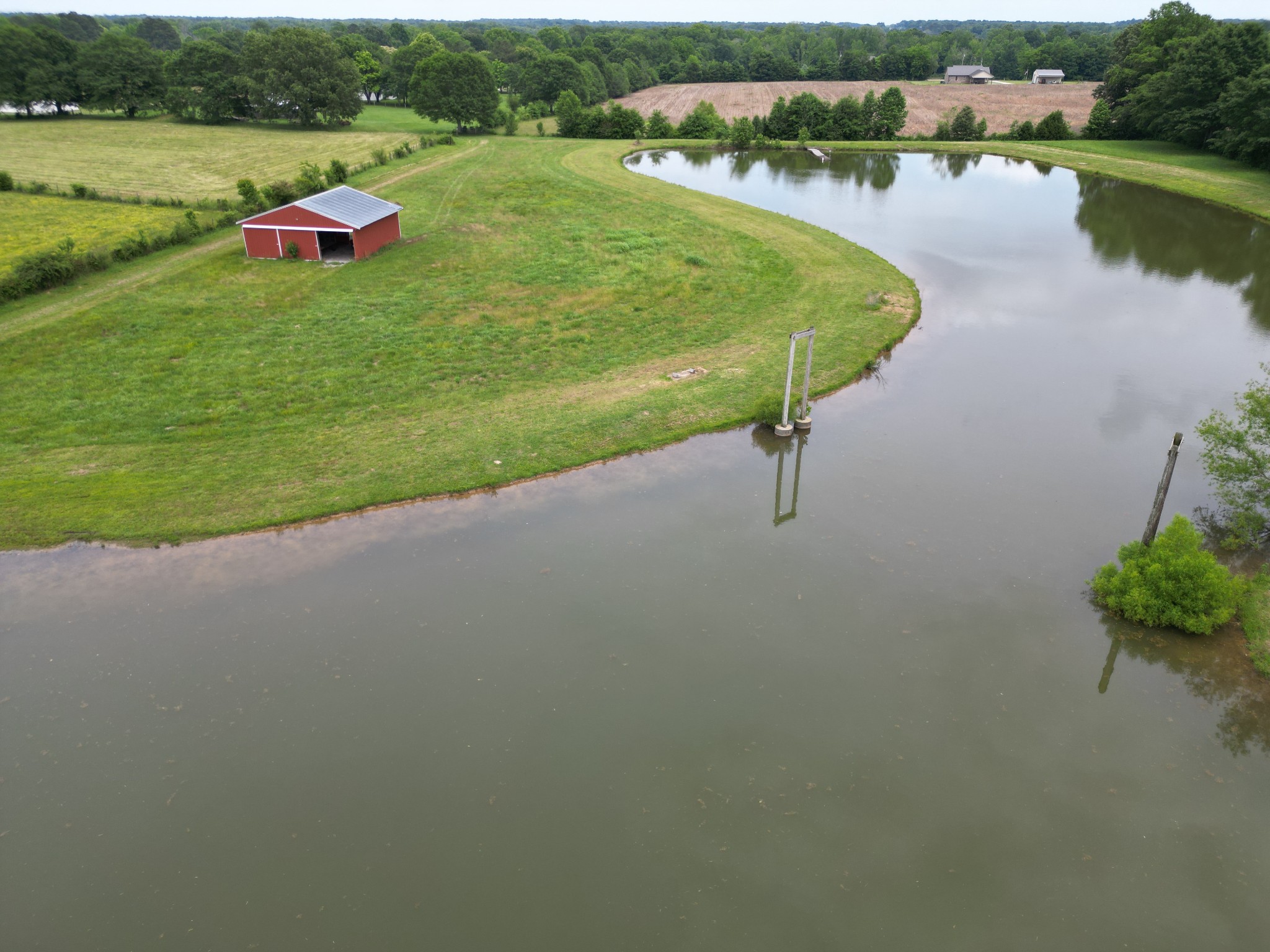 81 Slaughter Pen Road Ardmore, TN 38449 - Photo 60 of 63 a view of a lake with a yard and lake view