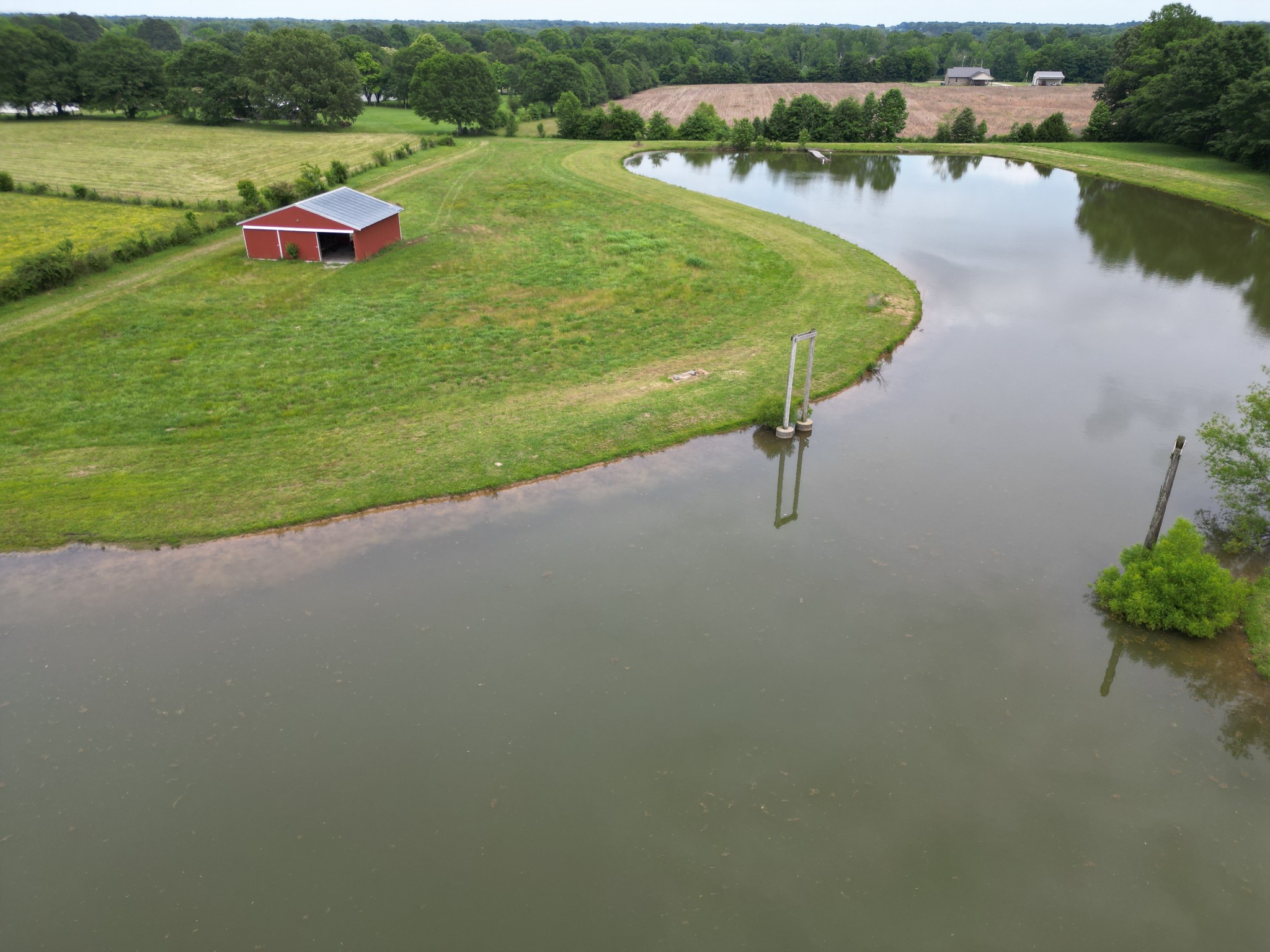 81 Slaughter Pen Road Ardmore, TN 38449 - Photo 61 of 63 a view of a lake with a yard and lake view