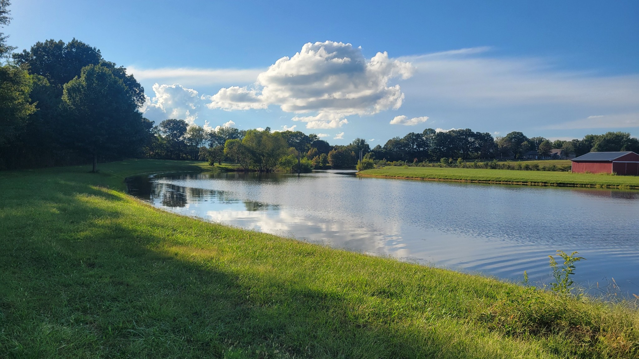 81 Slaughter Pen Road Ardmore, TN 38449 - Photo 63 of 63 a view of a lake with houses in the back