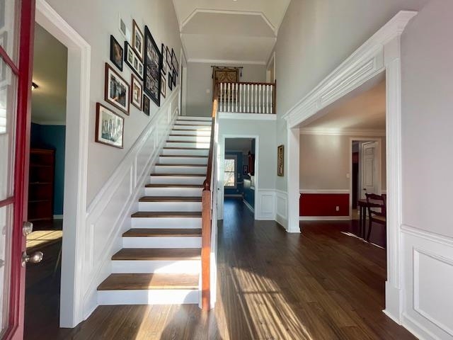 8028 Old Brownsville Road Bartlett, TN 38002 - Photo 3 of 35 a view of entryway and hall with wooden floor