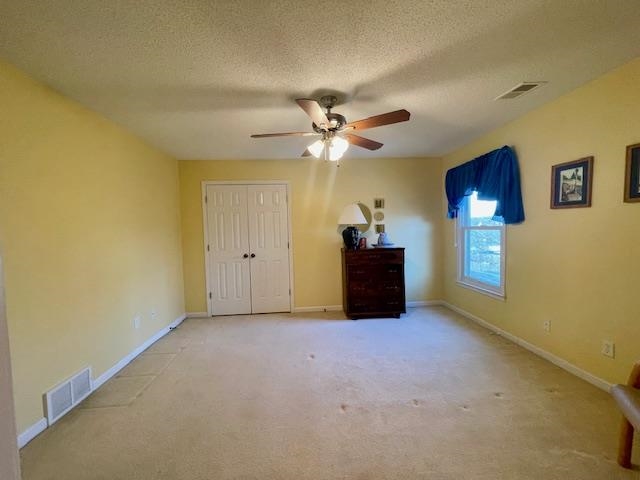 8028 Old Brownsville Road Bartlett, TN 38002 - Photo 31 of 35 a view of an empty room with a ceiling fan and window