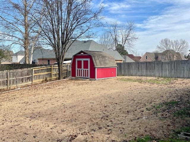 8028 Old Brownsville Road Bartlett, TN 38002 - Photo 32 of 35 a view of a yard with wooden fence