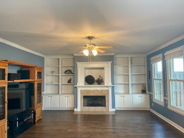 8028 Old Brownsville Road Bartlett, TN 38002 - Photo 5 of 35 a living room with a fireplace furniture a ceiling fan and a window
