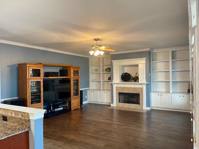 8028 Old Brownsville Road Bartlett, TN 38002 - Photo 6 of 35 a living room with furniture a fireplace and a flat screen tv