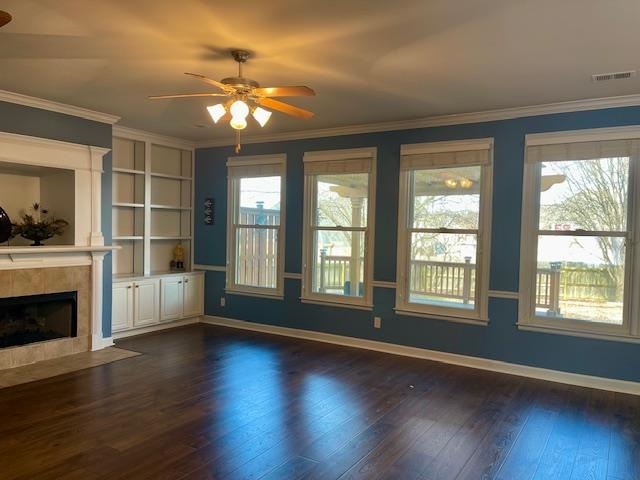 8028 Old Brownsville Road Bartlett, TN 38002 - Photo 7 of 35 a view of an empty room with wooden floor and a window