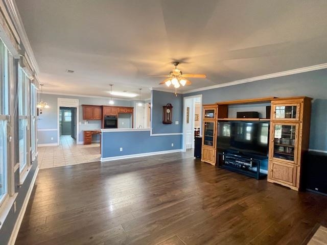 8028 Old Brownsville Road Bartlett, TN 38002 - Photo 8 of 35 a view of a living room kitchen with furniture and wooden floor