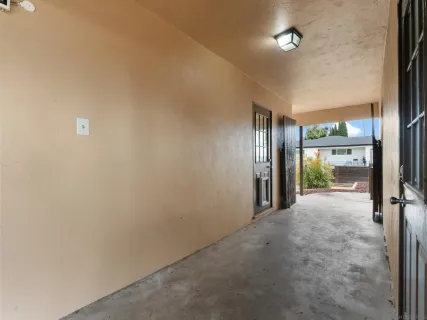 a view of house with backyard and garden