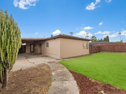 a view of a backyard with a garden