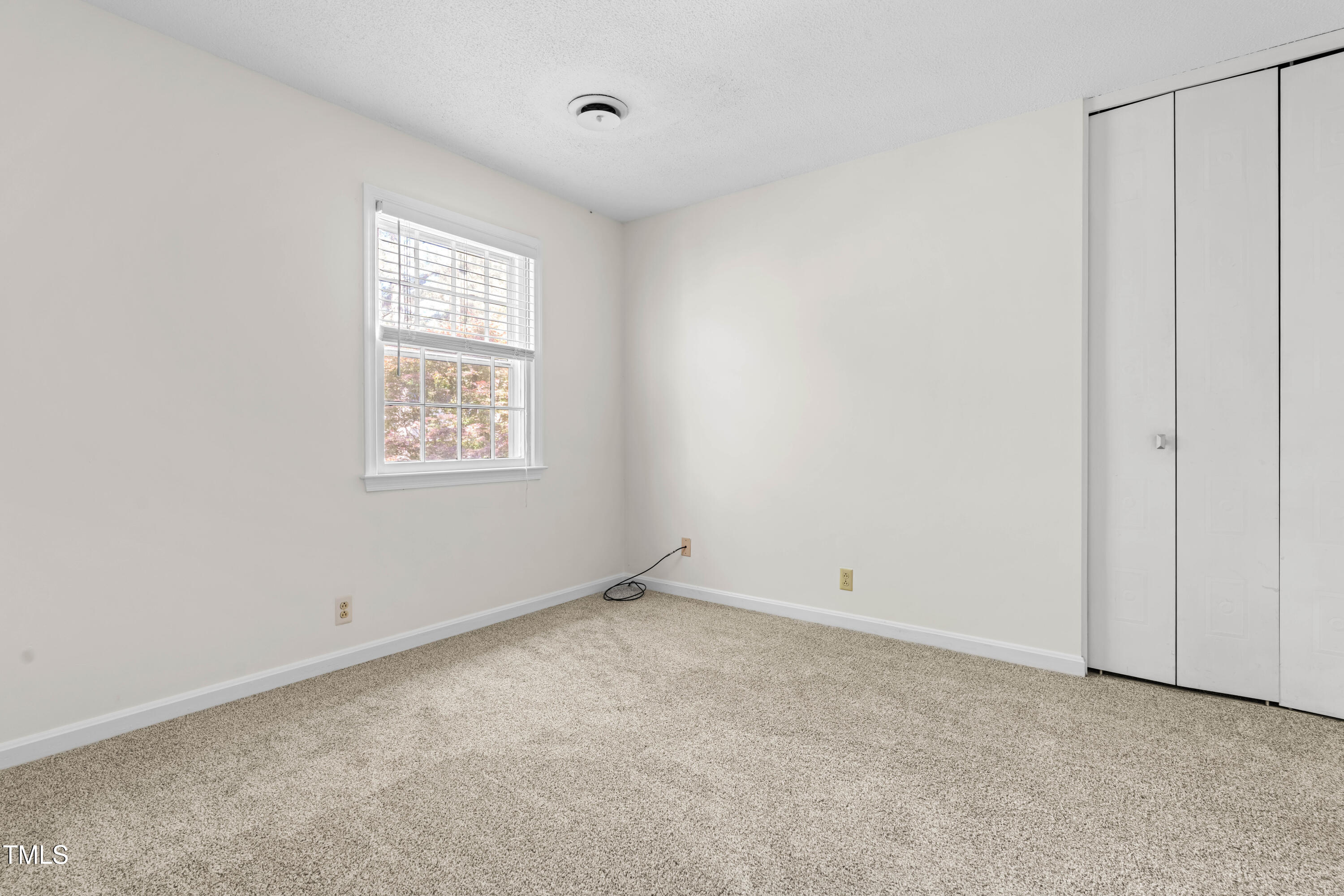 3029 Wycliff Road Raleigh, NC 27607 - Photo 23 of 35 a view of an empty room with a window