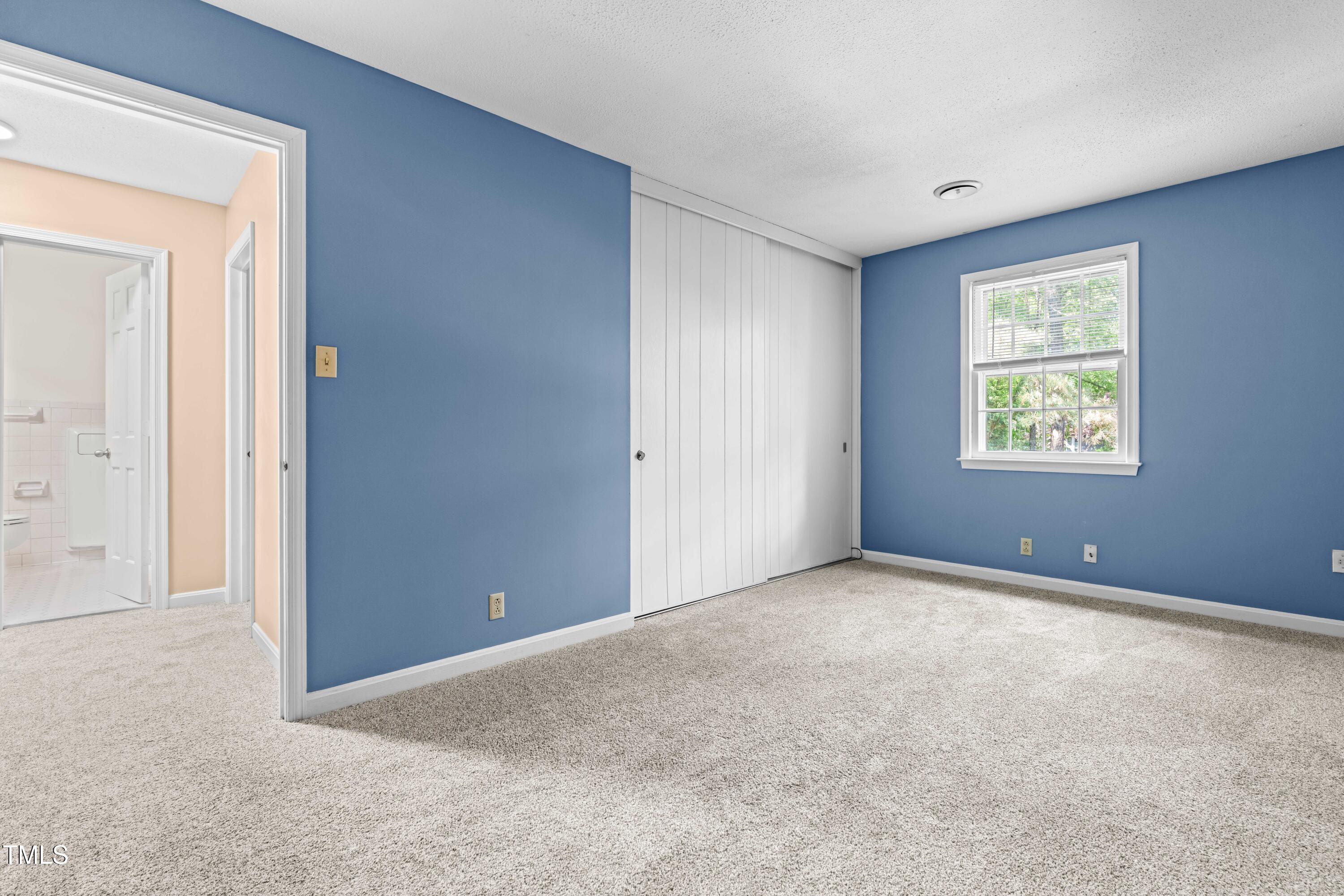 3029 Wycliff Road Raleigh, NC 27607 - Photo 24 of 35 an empty room with windows and closet
