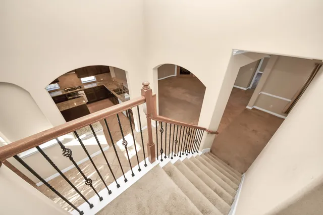 a view of balcony with wooden floor