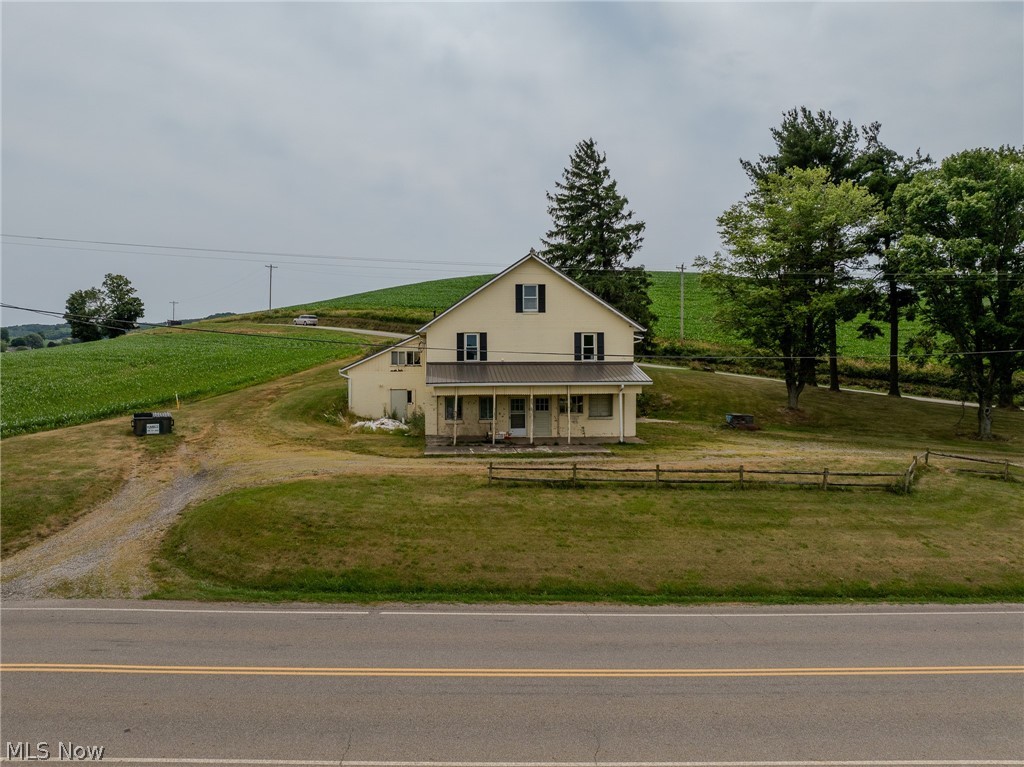 Farmhouse inspired home with covered porch