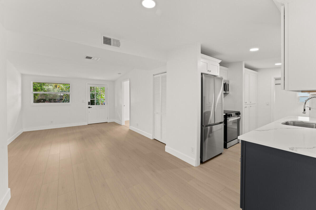 3797 Bahama Road Palm Beach Gardens, FL 33410 - Photo 17 of 33 a view of a kitchen with a sink