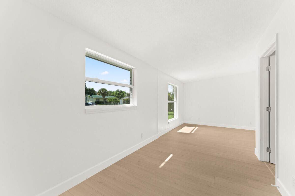 3797 Bahama Road Palm Beach Gardens, FL 33410 - Photo 24 of 33 an empty room with a window