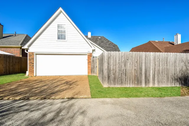 a view of backyard of house