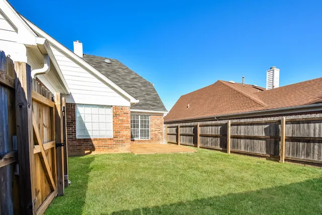 a view of outdoor space yard and front view of a house