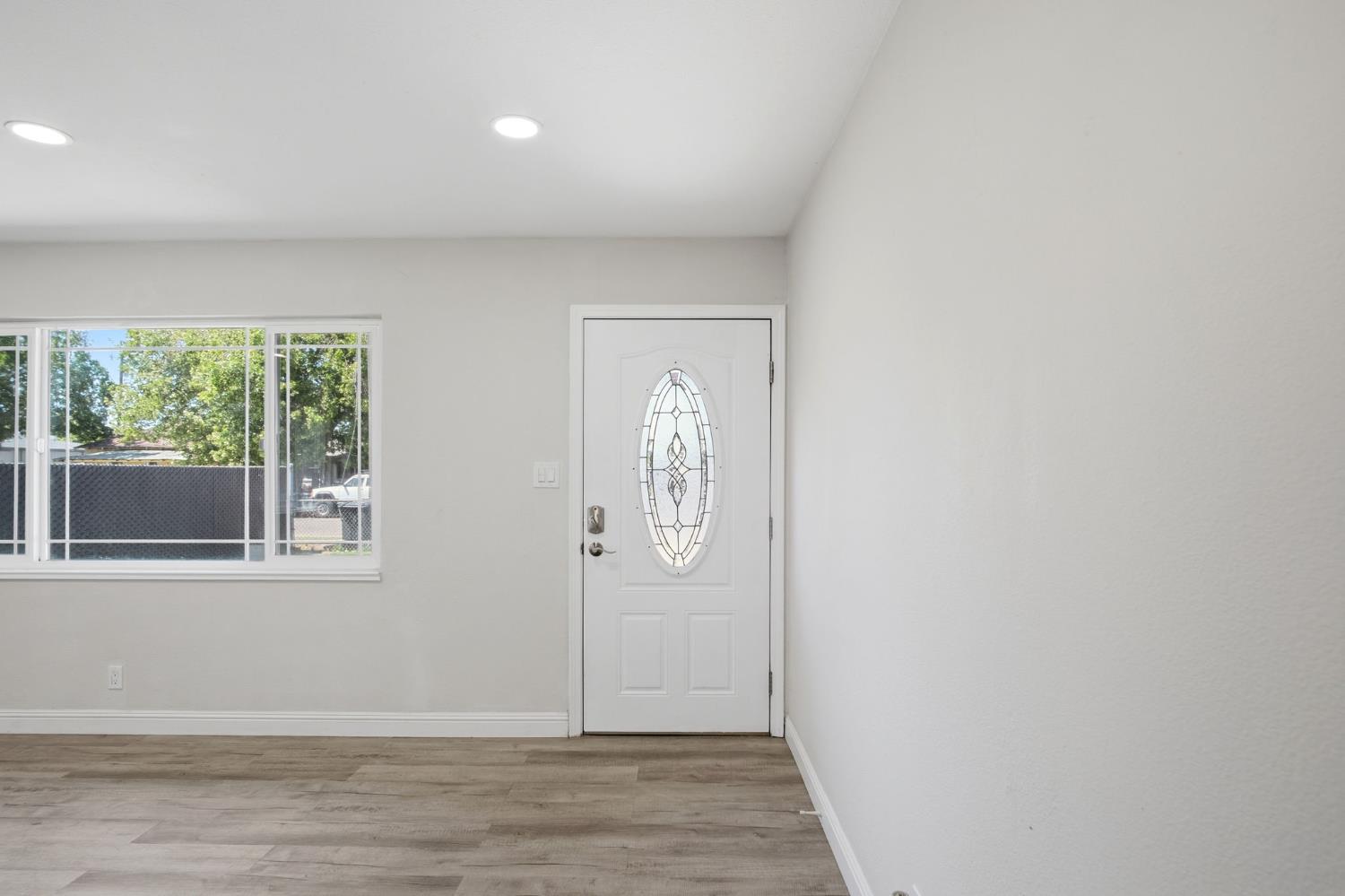 341 2nd Street Livingston, CA 95334 - Photo 4 of 19 a view of an empty room with a window