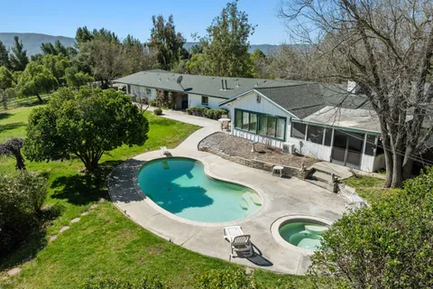 an aerial view of a swimming pool