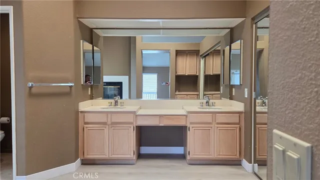 a bathroom with a tub and a sink