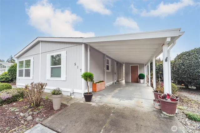 a front view of a house with patio