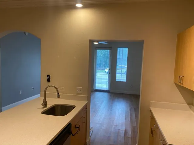 a sink sitting next to a bathroom sink