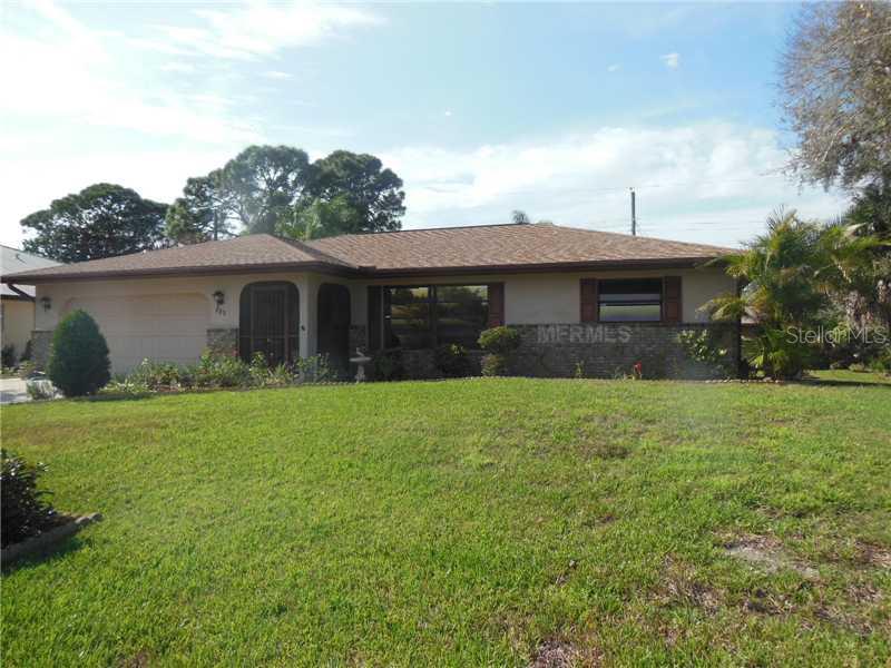 330 Southland Road Venice, FL 34293 - Photo 1 of 1 a front view of a house with a garden
