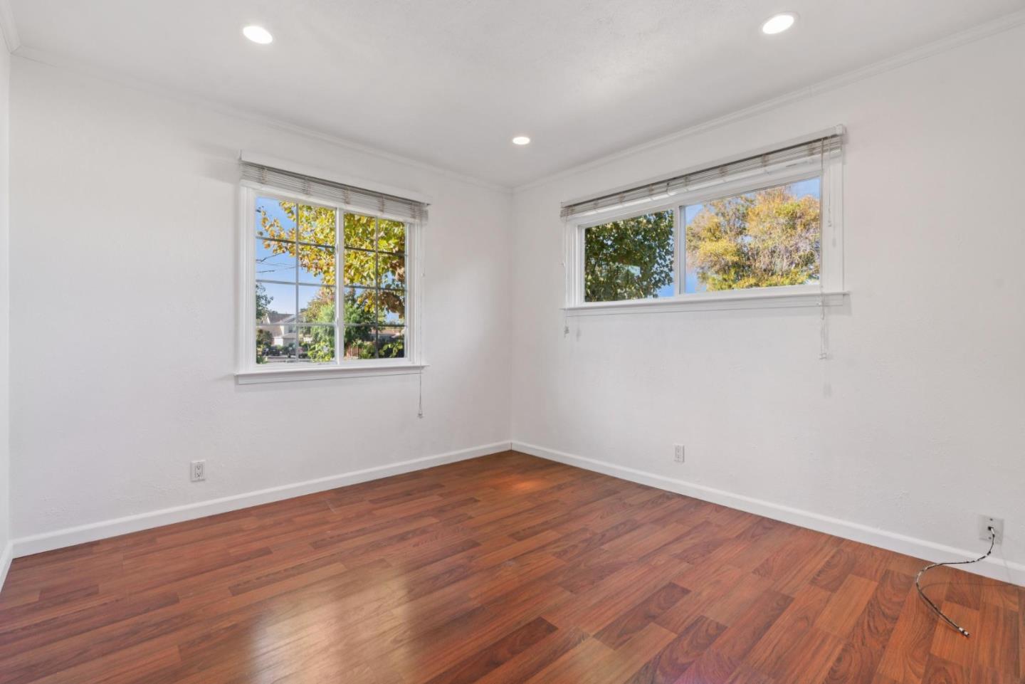 3107 Windsor Place Concord, CA 94518 - Photo 13 of 21 an empty room with wooden floor and window