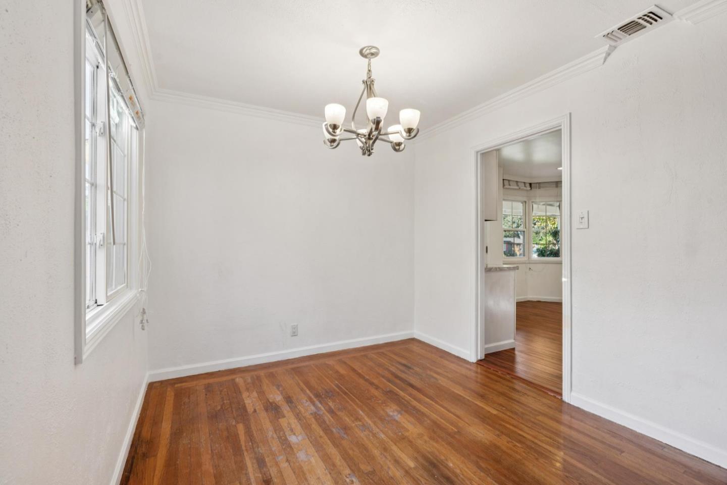 3107 Windsor Place Concord, CA 94518 - Photo 7 of 21 a view of an empty room with wooden floor