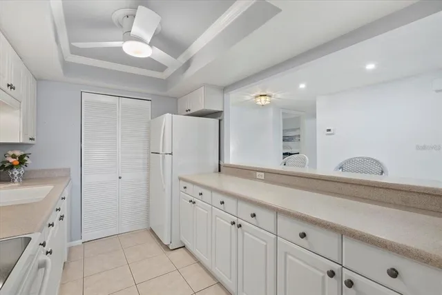 a spacious bathroom with a double vanity sink mirror and shower