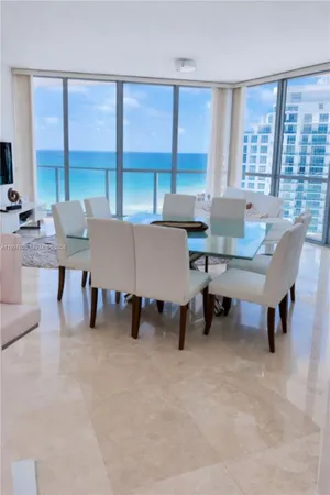 a view of a livingroom with furniture and window