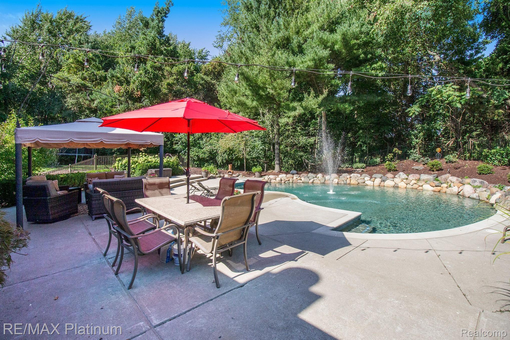 3859 Brighton Road Howell, MI 48843 - Photo 31 of 46 Pool patio