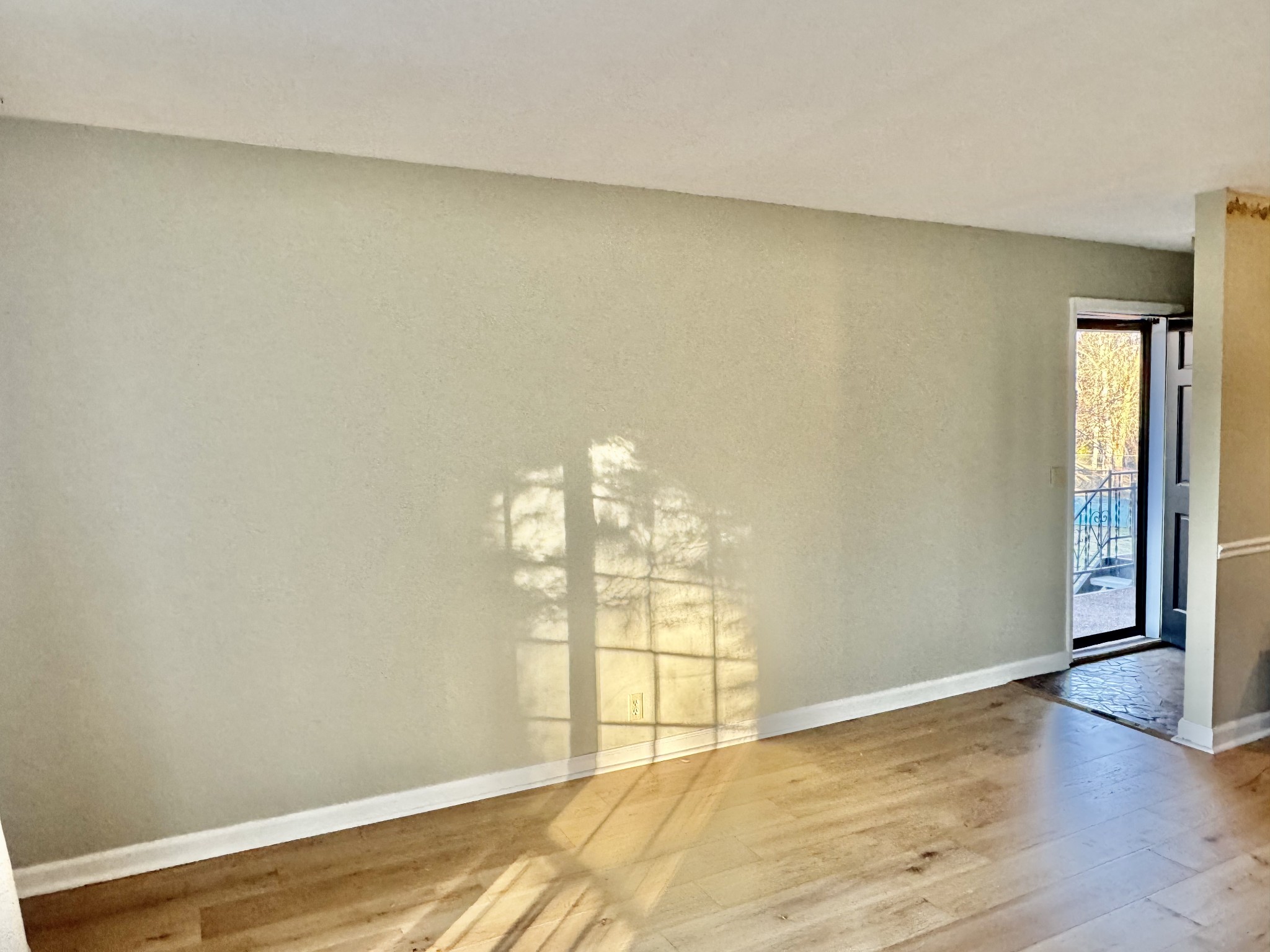 601 Boyd Mill Avenue, Unit M3 Franklin, TN 37064 - Photo 4 of 19 a view of empty room with wooden floor and fan