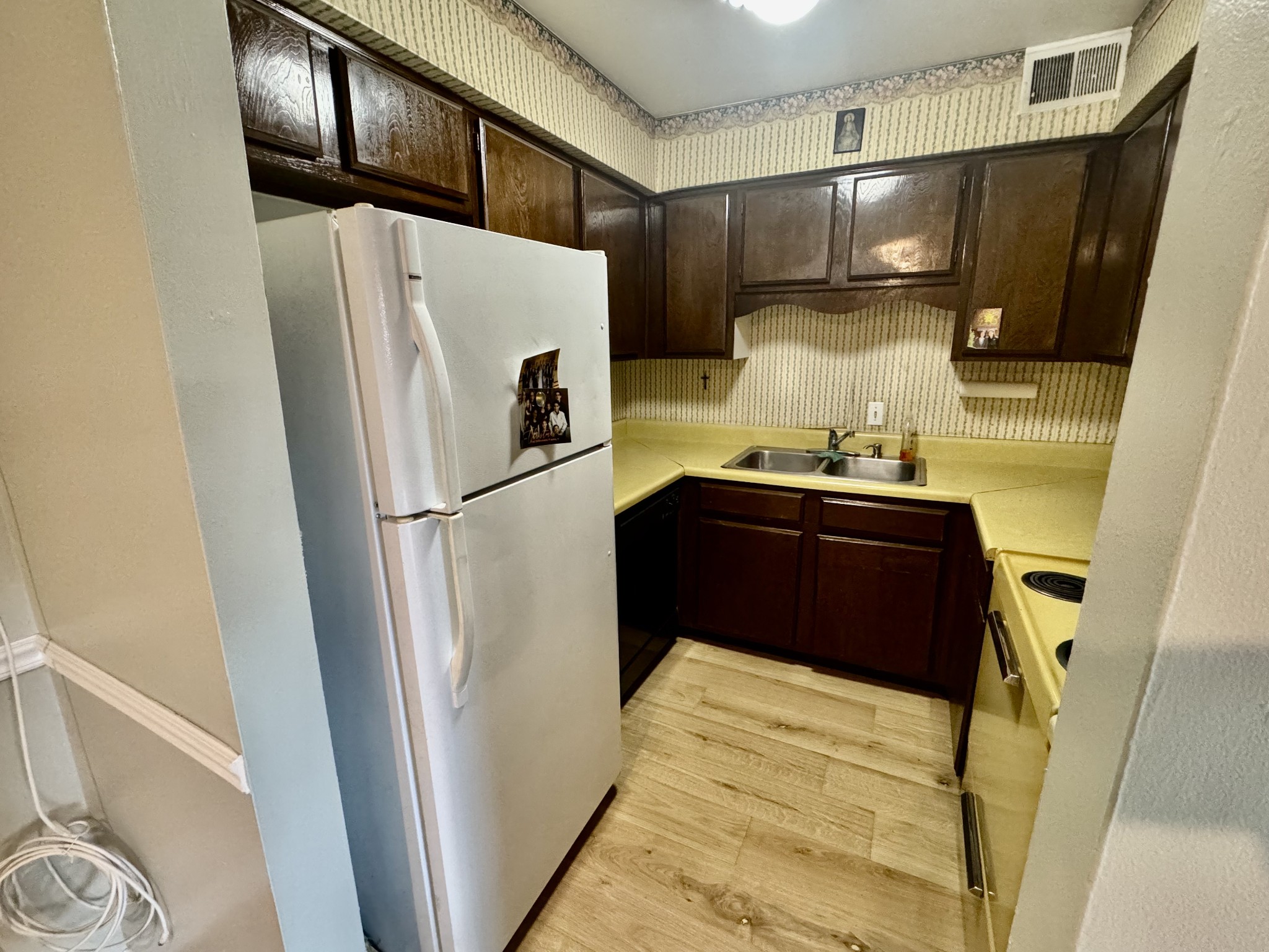 601 Boyd Mill Avenue, Unit M3 Franklin, TN 37064 - Photo 7 of 19 a kitchen with stainless steel appliances a refrigerator and a sink