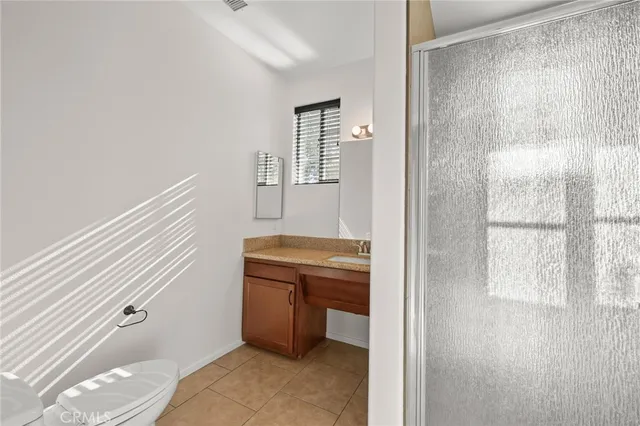 a room with a sink and a mirror