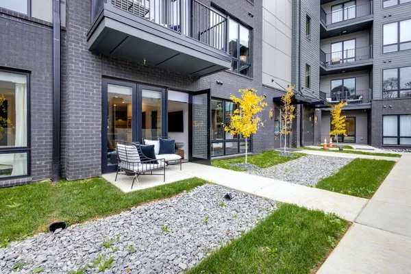 a room with gym equipment and a large window