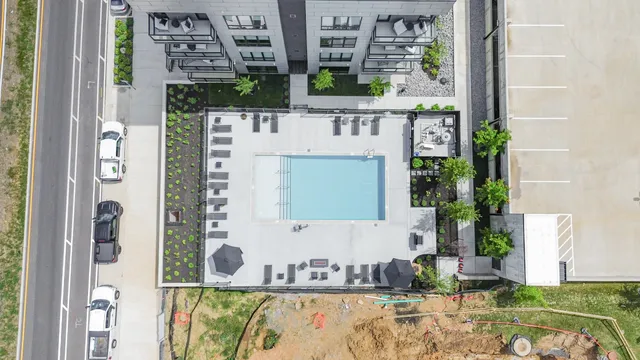 a view of a patio with swimming pool