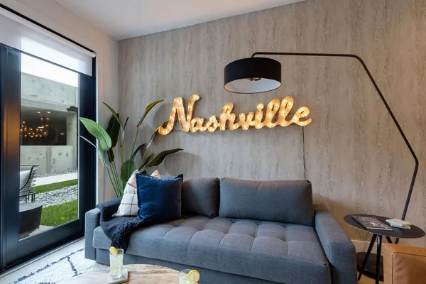 a living room with furniture and a window