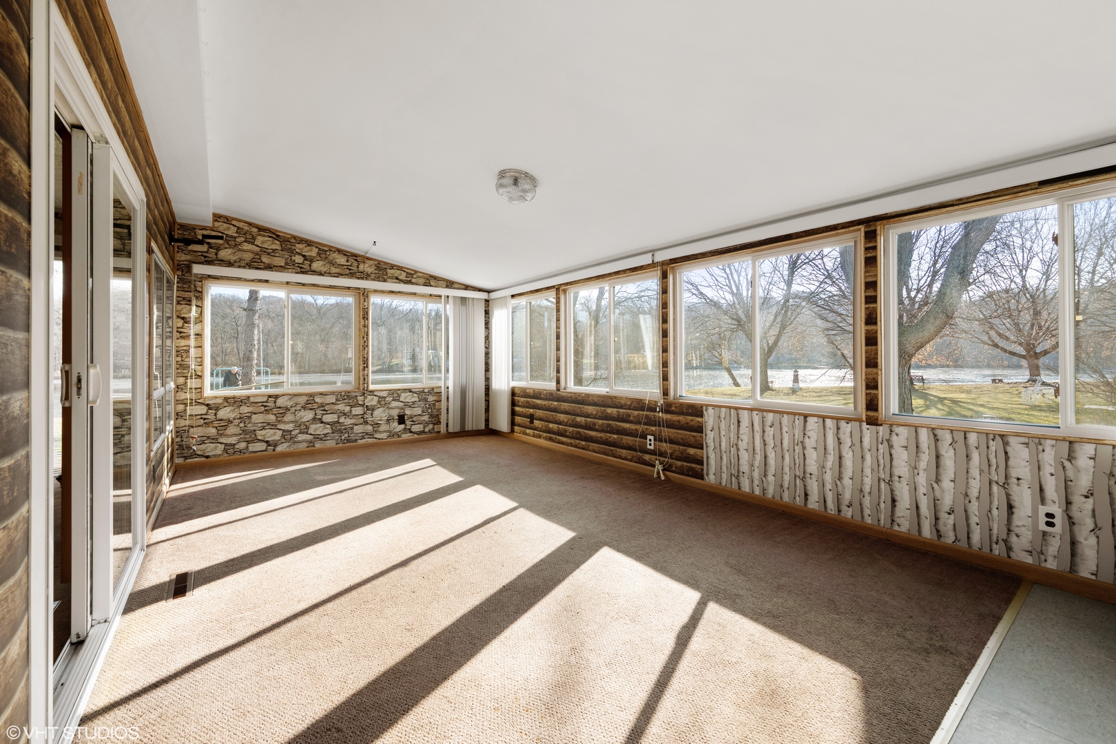 1133 Country Club Road Elgin, IL 60123 - Photo 3 of 19 a view of a room with wooden floor and windows