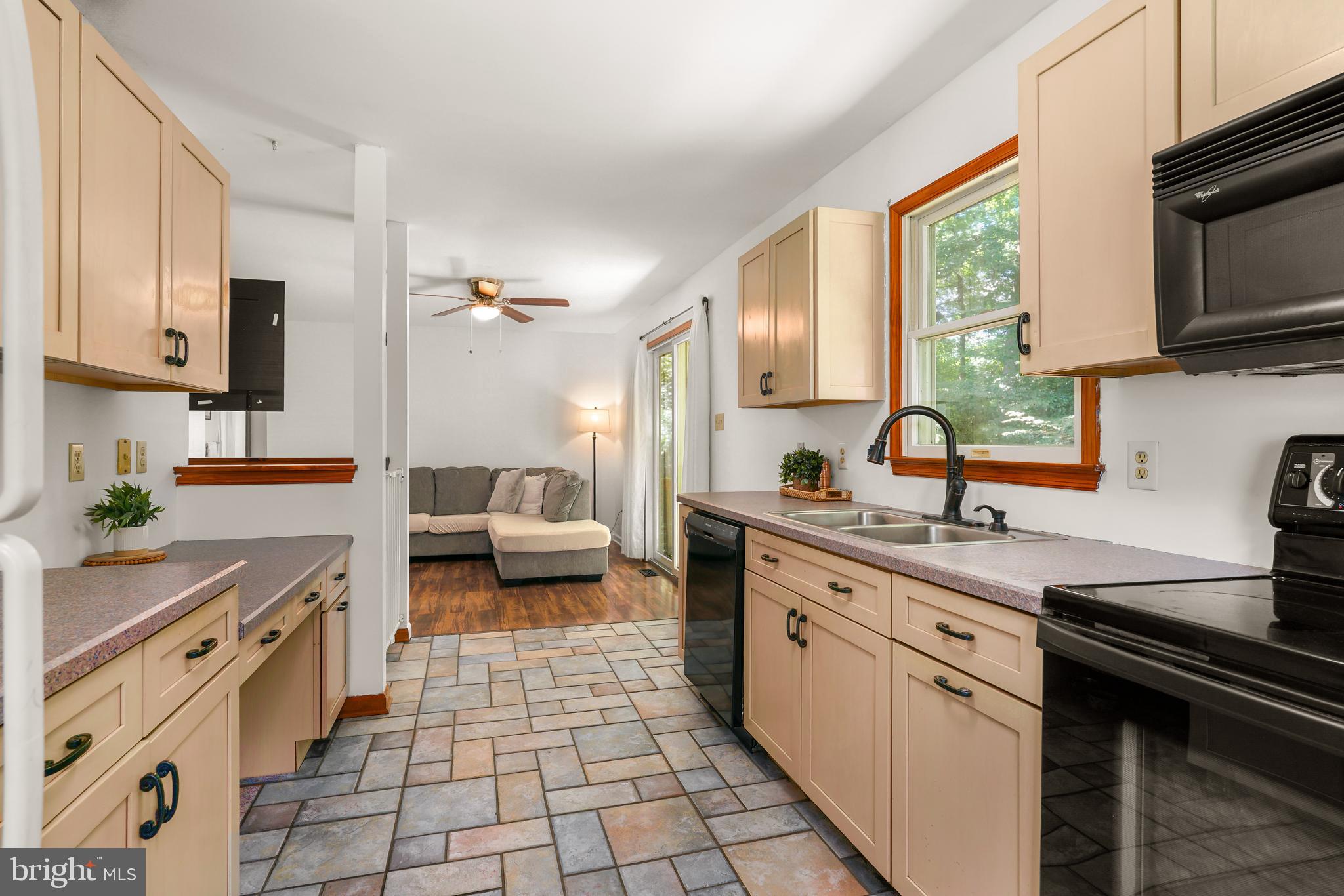 9 Kings Court Elkton, MD 21921 - Photo 11 of 33 a kitchen with a sink stove and microwave