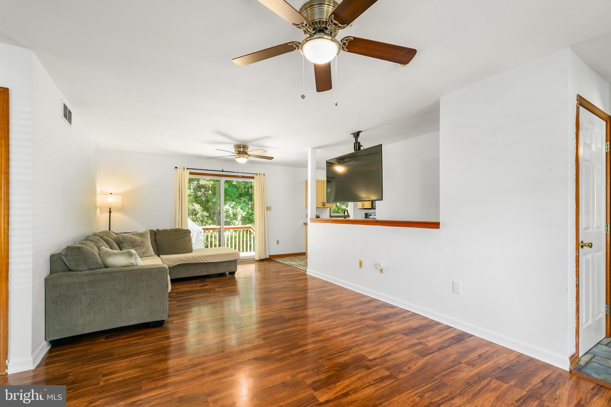 9 Kings Court Elkton, MD 21921 - Photo 6 of 33 a living room with furniture and a flat screen tv