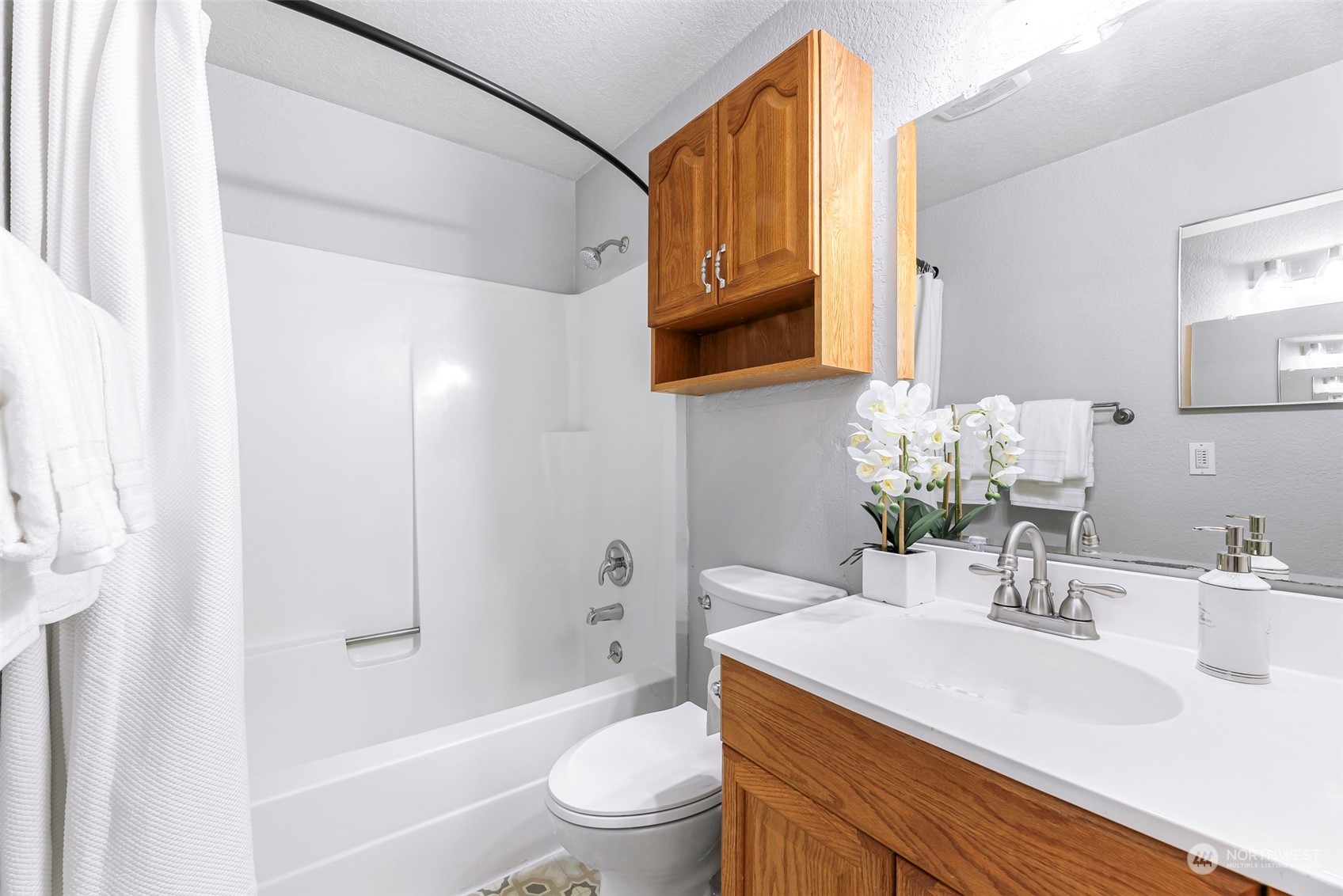 18216 22nd Drive Southeast Bothell, WA 98012 - Photo 29 of 40 a bathroom with a sink a toilet and shower
