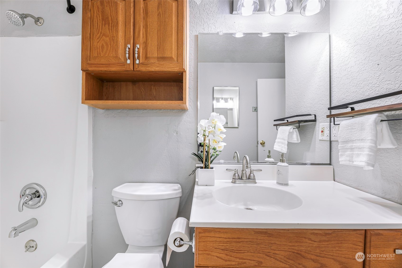 18216 22nd Drive Southeast Bothell, WA 98012 - Photo 30 of 40 a bathroom with a sink and a mirror