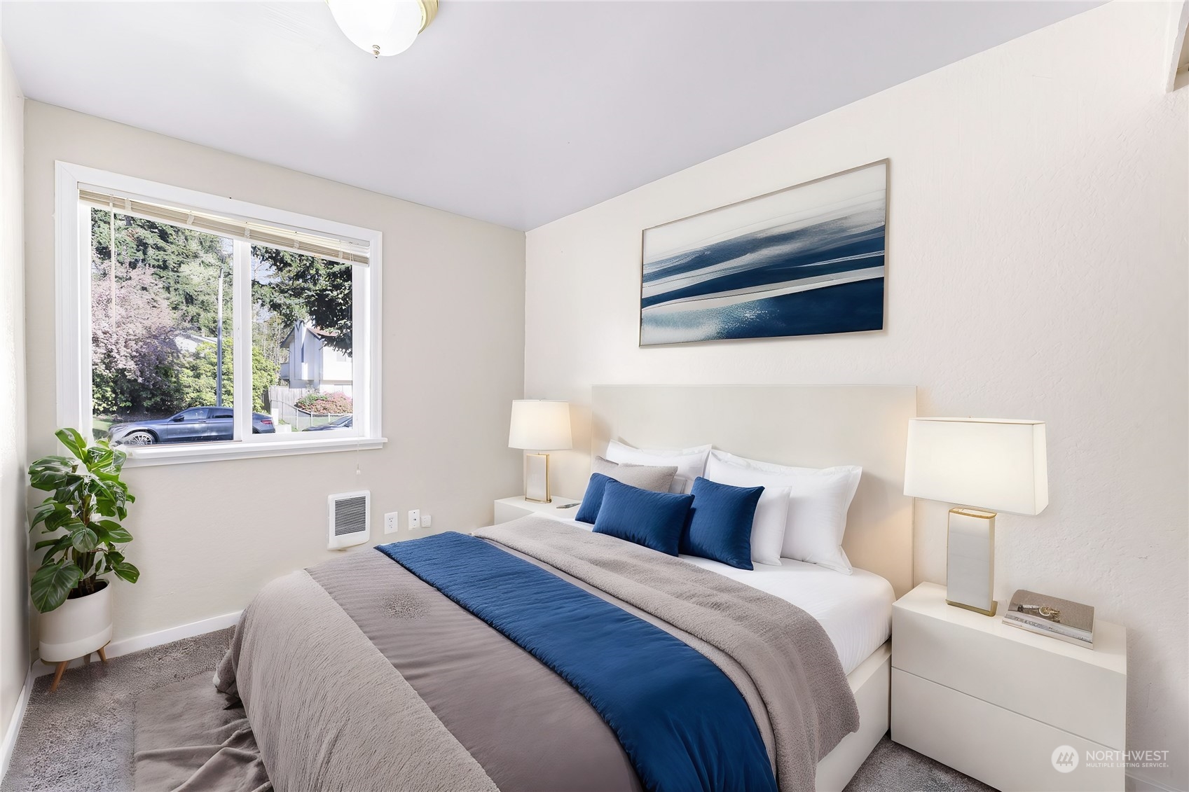 18216 22nd Drive Southeast Bothell, WA 98012 - Photo 34 of 40 a bedroom with a bed and a potted plant