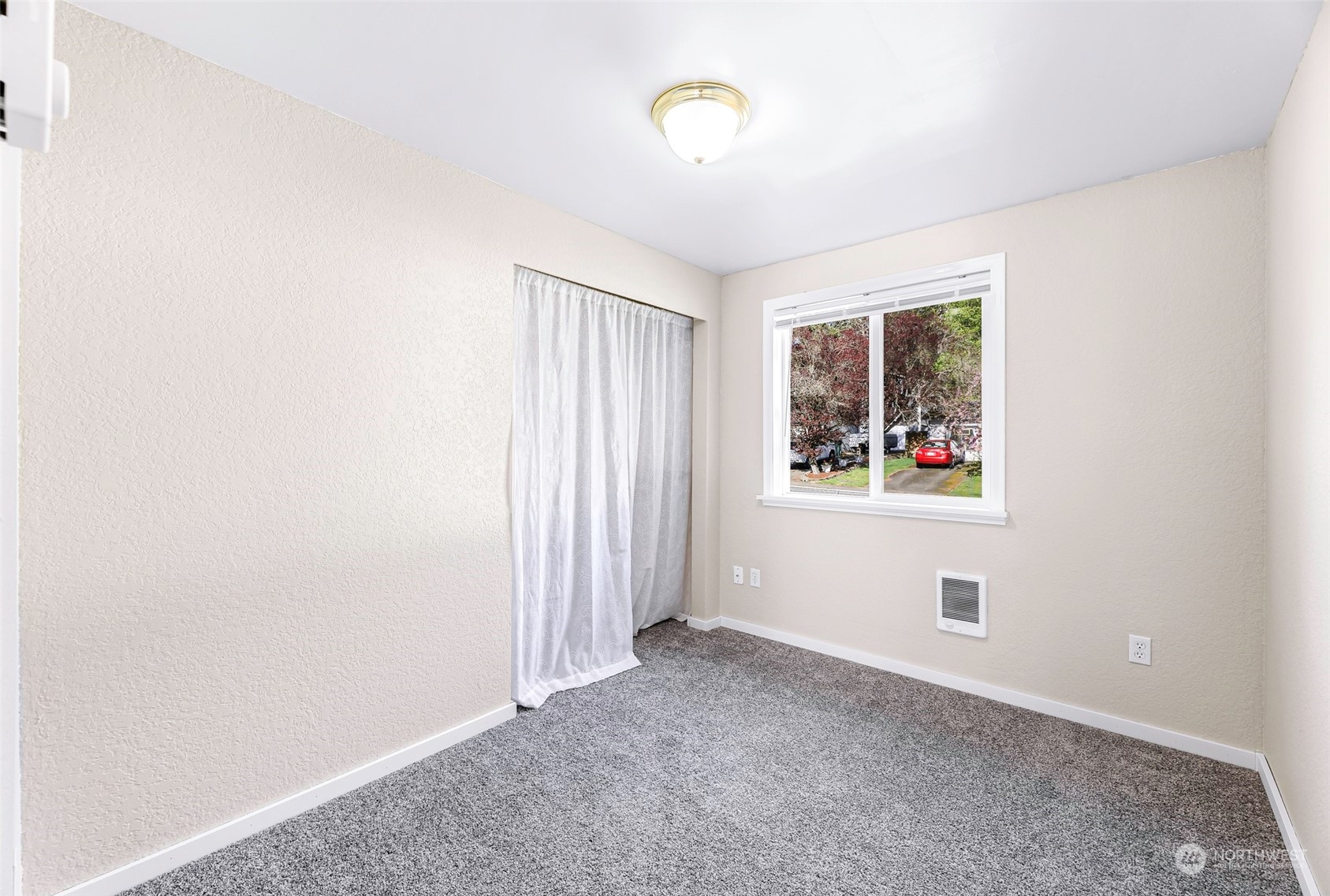 18216 22nd Drive Southeast Bothell, WA 98012 - Photo 35 of 40 an empty room with windows