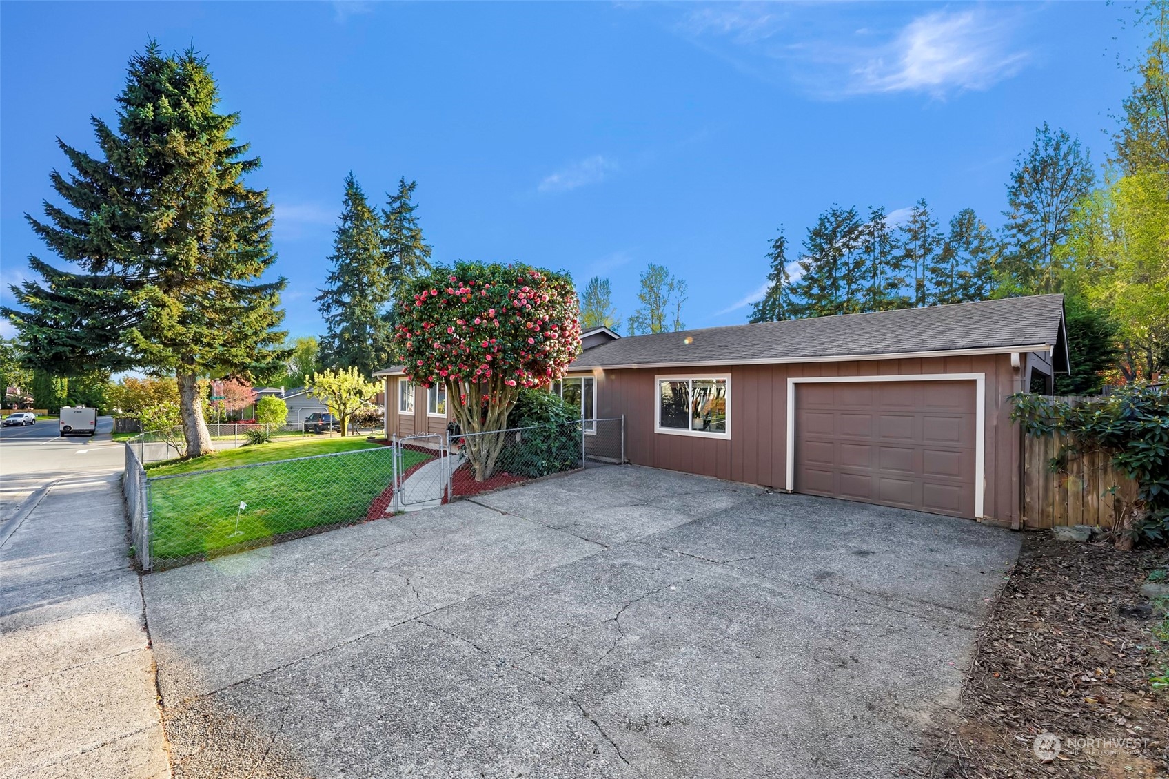 18216 22nd Drive Southeast Bothell, WA 98012 - Photo 39 of 40 a view of a house with a yard and large tree