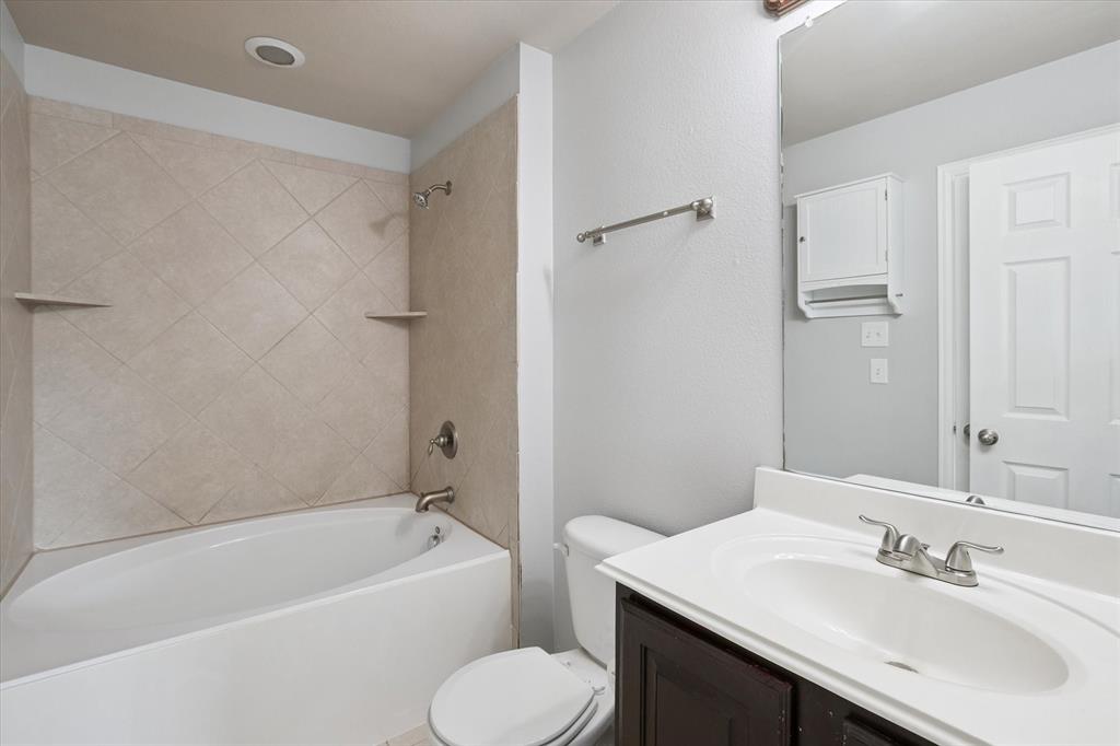 2202 Sandshell Street Bedford, TX 76021 - Photo 26 of 40 Bathroom with shower / tub combination and vanity