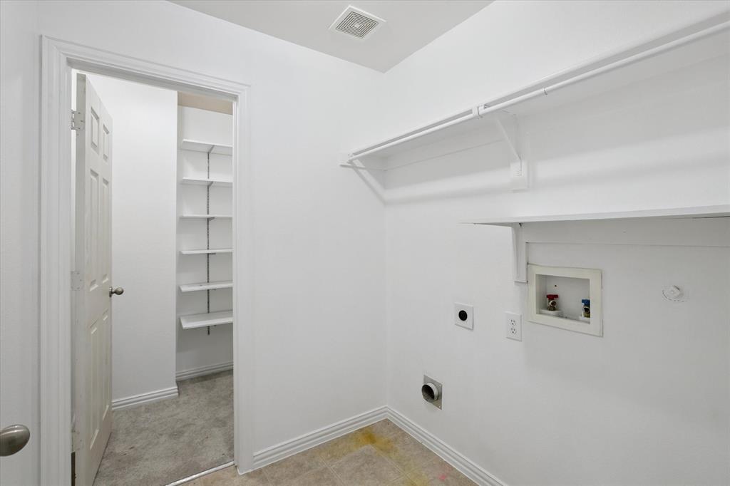 2202 Sandshell Street Bedford, TX 76021 - Photo 27 of 40 Washroom featuring electric dryer hookup and hookup for a washing machine