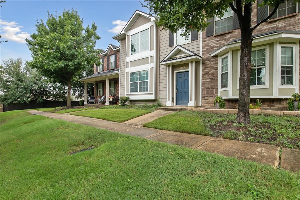 2202 Sandshell Street Bedford, TX 76021 - Photo 4 of 40 View of front of home featuring a front lawn, brick siding, and a porch